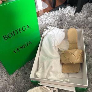 Bottega Veneta cream and tan leather slide sandals